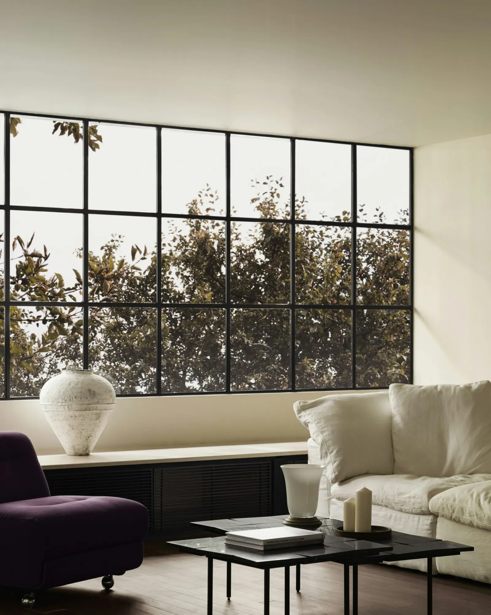 A modern living room with window dressings